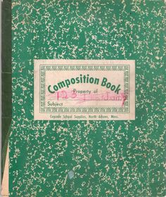 a green book with white speckles on it