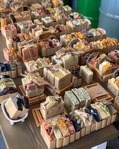 many different types of soaps on a table