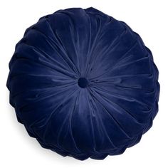 a blue velvet round pillow on a white background