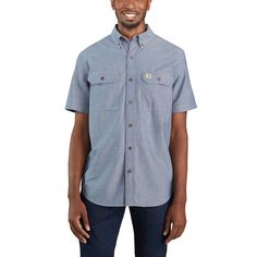 Appearance counts. From the front office to the jobsite and back, this chambray work shirt keeps you looking good on the job. It's prewashed for softness, and the lightweight cotton fabric offers breathable comfort. The original fit gives you plenty of room to move.4.5-ounce, 100% cotton ringspun chambrayCarhartt-strong, triple-stitched main seamsGarment-washed for a soft finish and reduced shrinkageButton-down collar and frontShoulder pleats for ease of movementTwo chest pockets with mitered fl Leader Of The Pack, Western Apparel, Carhartt Shirts, Front Office, Men Carhartt, Button Down Shirt Mens, Lightweight Shorts, Work Shirt, Men's Knit