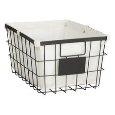 a white and black wire basket with two large bins on the bottom, one is empty