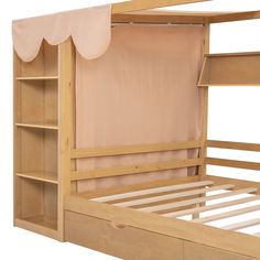 a wooden bunk bed with a pink curtain over it's headboard and foot board