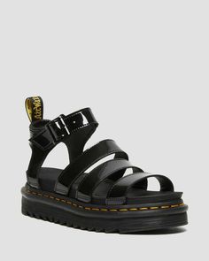 Shop Blaire Patent Leather Strap Sandals at Dr. Martens. Free delivery on orders over $50 Blaire Sandal, Dr Martens Blaire, Boots Chelsea, Leather Strap Sandals, Black Gladiator Sandals, Leather Gladiator Sandals, Dr Martens Black, Leather Wear, Bag Brand