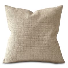 a beige pillow on a white background