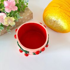 two vases sitting next to each other on a table