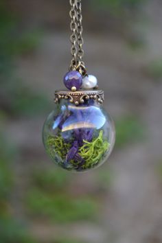 PLEASE read my shop announcement before placing an order so you know what to expect right now. Plus, when ordering from outside Europe, don't forget to provide a phone number for the courier to ensure the fastest and smoothest delivery. Absolutely charming and magical dried lavender and moss bottle necklace with pearl and amethyst stones. Perfect for an Enchanted Forest or Woodland themed wedding. * Freshwater pearl and genuine amethyst beads * Real dried lavender flowers obtained from a sustain Nature-inspired Purple Necklace For Gift, Handmade Purple Necklace For Keepsake, Woodland Themed Wedding, Pearl And Amethyst, Lavender Necklace, Real Flower Necklace, Dried Lavender Flowers, Necklace With Pearl, Terrarium Necklace