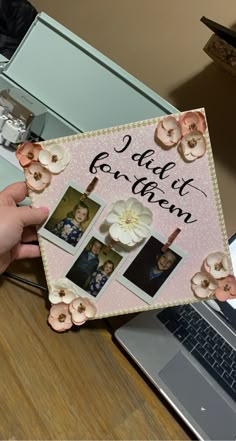 a person holding up a card with photos and flowers on it that reads, i didn't even