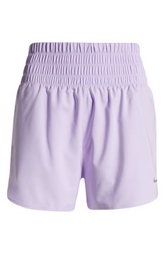 Gear up for your run with these lightweight high-waisted shorts constructed from moisture-wicking fabric and designed with brief lining for extra support. 3" inseam; 26" leg opening; 13 1/2" front rise; 17" back rise (size Medium) Elastic waist Side-seam pockets Dri-FIT moisture-wicking technology Brief liner 100% polyester Machine wash, tumble dry Imported Nike Athletic Shorts With Elastic Waistband For Gym, Nike Nylon Running Shorts, Nike Running Shorts Athleisure Style, Nike Running Nylon Shorts, Nike High-waisted Workout Shorts, Nike Breathable Nylon Shorts, Go-dry Nylon High-waisted Athletic Shorts, Nike Gym Shorts With Elastic Waistband, Nike Sporty High-waisted Athletic Shorts