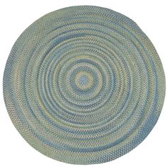 a circular rug with blue and green colors