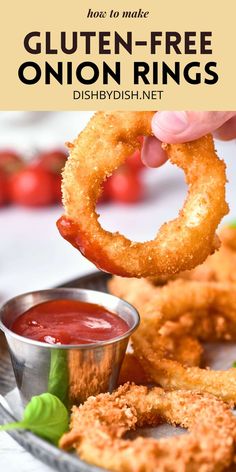 a person dipping sauce on onion rings in a bowl with the words, how to make gluten - free onion rings dishdish net