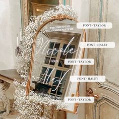 an ornate mirror with white flowers on it and the words welcome to the wedding written in cursive font