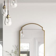 a bathroom with a sink, mirror and lights