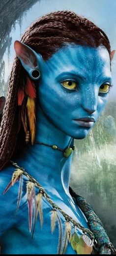 a woman with blue skin and yellow eyes is dressed up as avatar from the film avatar