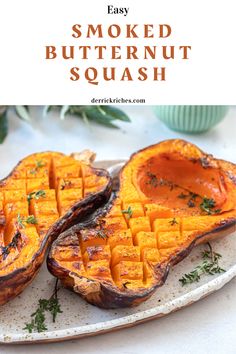 baked butternut squash on a plate with herbs