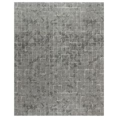 an area rug with grey squares on it