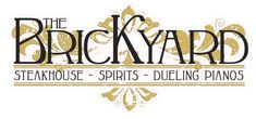 the logo for the brickyard steakhouse and spirits dueling pianos, which is located in