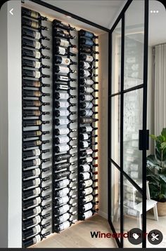 a wine rack in the corner of a room