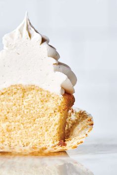 a piece of cake with white frosting and icing sitting on top of it