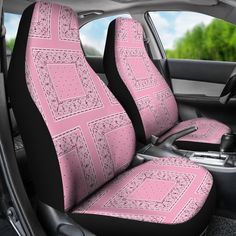 the interior of a car with pink seat covers