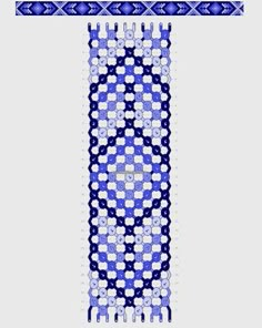 a blue and white pattern on the side of a wall hanging from a metal pole