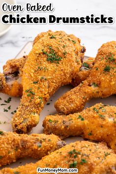 oven baked chicken drumsticks on a cutting board