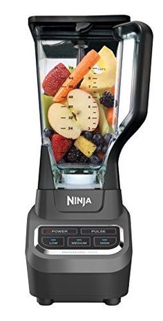 a blender filled with lots of different types of fruit