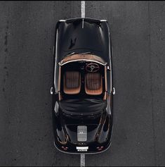 an overhead view of a black sports car