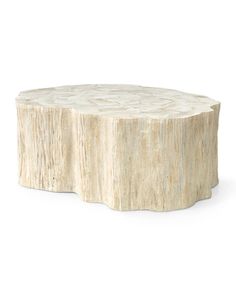 a round wooden table with white paint on the top and wood grain in the middle