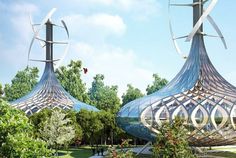 an artistic rendering of two futuristic structures in the park