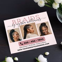 a business card with three braids on it next to some flowers and white carnations