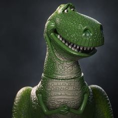 a close up of a toy dinosaur on a black background