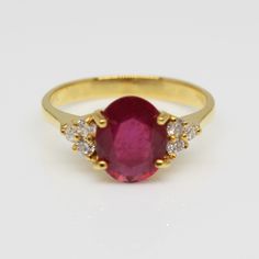 THE RUBY 1 PEC. – 2 . 38 CARATS. WITH DIAMONDS 6 PECS. – 0 . 14 CARAT. 18 K.- 750 YELLOW GOLD RING 3 . 20 GRAMS. WIDTH 0 . 90 X LENGTH 1 . 90 CM. ANY SIZE IS AVAILABLE PLEASE CONTACT FOR MORE INFORMATION Druzy Ring, Ruby