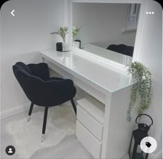 a white desk with a mirror and chair