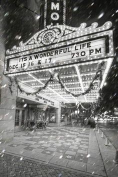 the marquee for its wonderful life is lit up in the snow