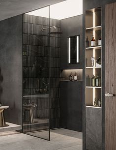 a bathroom with a glass shower door next to a table