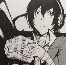 an anime character with headphones holding a book