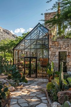 a house that is surrounded by plants and rocks