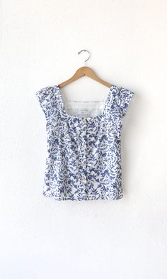 Cotton Square Neck Blouse With Floral Print, Cotton Blouse With Floral Print And Square Neck, Summer Square Neck Top With Buttons, Square Neck Top With Buttons For Summer, Summer Square Neck Top With Button Closure, Summer Tops With Square Neck And Button Closure, Square Neck Summer Tops With Button Closure, Cotton Top With Floral Embroidery And Square Neck, Cotton Floral Embroidery Square Neck Top