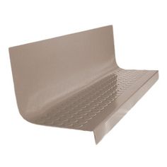 a beige plastic shelf with holes on the bottom