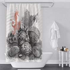 a shower curtain with an image of sea animals and corals in the water on it