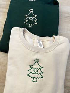 Christmas Prints For Shirts, Diy Christmas T-shirt, Cute Christmas Hoodies, Winter Sweatshirt Ideas, Green Cotton Hoodie With Embroidered Graphics, Embroidery Christmas Sweatshirt, White Embroidered Sweatshirt For Winter, Cotton Sweatshirt With Machine Embroidery For Winter, Hooded Tops With Machine Embroidery For Winter