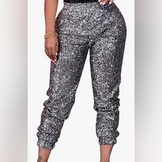 Metallic Sequin Glitter Joggers.Other Sizes Available Metallic Shiny Bottoms For Party, Silver Fitted Shimmer Bottoms, Silver Fitted Bottoms For Club, Fitted Silver Bottoms For Club, Fall Party Shimmer Bottoms, Metallic Disco Bottoms For Party, Silver Shimmer Bottoms For Party, Silver Bottoms For Winter Night Out, Metallic Sparkling Bottoms For Party