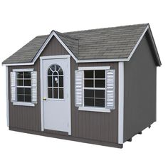 a small gray and white shed with windows