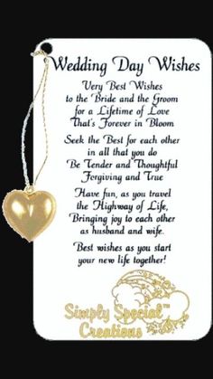 a wedding day wishes card with a heart hanging from it's end and the words,