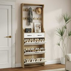 a shoe rack with shoes on it in a living room next to a white door