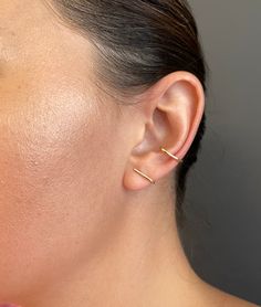 The Midi Crusader Ear Lobe Cuff Earring is a modern earring that hugs the bottom of the ear lobe. Wear it solo or paired with others to create a unique look. 14k gold sold as a single Lobe Cuff, Cuff Earring, Sell Gold, Bar Earrings, Modern Earrings, Crusades, Cuff Earrings, The Ear, 14k Gold