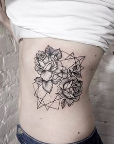 a woman's stomach with flowers and geometric shapes on it, as well as the bottom