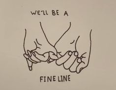 two hands holding each other with the words, we'll be a fine line