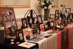 there are many pictures on the table with flowers in vases next to each other