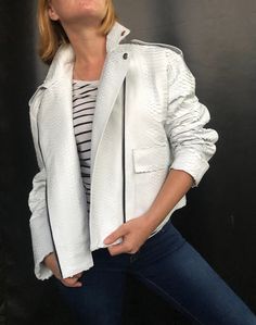 Oversize White Women's Snakeskin Biker Jacket PREMIUM QUALITY LUXURY STYLE Outside: GENUINE PYTHON LEATHER Accessories: silver color (please see the photo). All our products are 100% handmade, we always try to create interesting ideas to make your style unique. We use only the highest quality materials and accessories from around the world and only best leather from Indonesia. Before listing each new model undergoes different quality and usability tests at every stage of production. Every single White Long Sleeve Biker Outerwear, Casual White Leather Jacket With Zipper, Casual White Leather Jacket With Zipper Closure, White Biker Leather Jacket For Spring, White Leather Jacket With Zipper Closure, Trendy White Leather Biker Jacket, Chic White Leather Jacket For Winter, White Leather Jacket With Zipper For Winter, White Leather Jacket With Zipper Closure For Winter